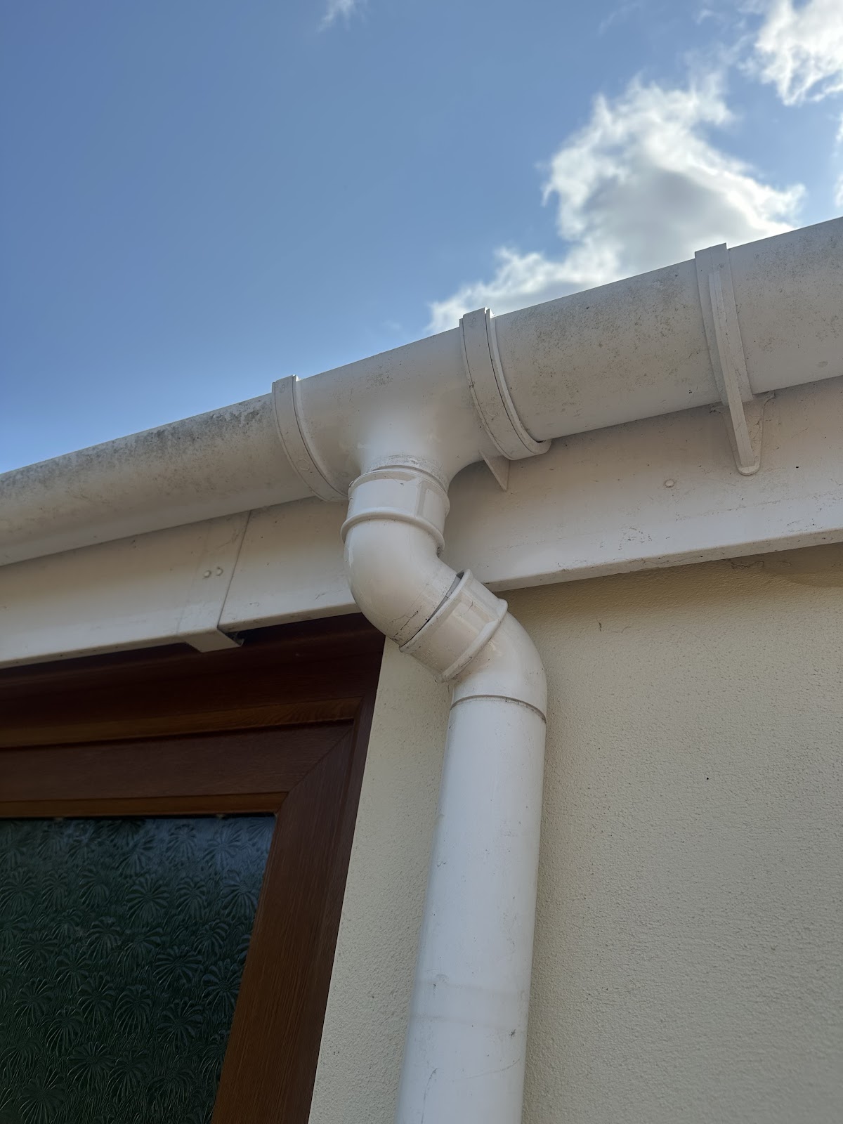 Clean gutter and downpipe detail