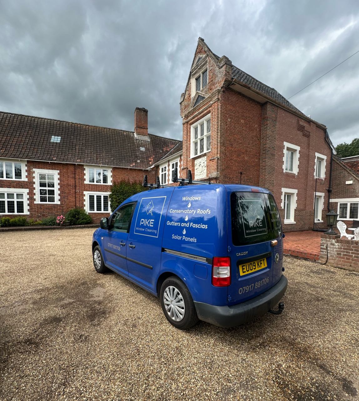 Blue Pike Window Cleaning van on location